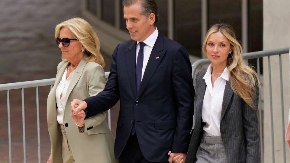 Hunter Biden, President Joe Biden's son, accompanied by his mother, first lady Jill Biden and his wife, Melissa Cohen Biden, walks out of federal court after hearing the verdict, Tuesday, June 11, 2024, in Wilmington, Del. Hunter Biden has been convicted of all 3 felony charges in the federal gun trial.