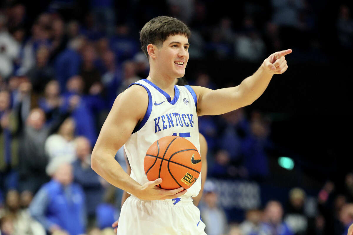 Reed Sheppard #15 of the Kentucky Wildcats celebrates during the 96-88 OT win against the Saint Joseph's Hawks at Rupp Arena on November 20, 2023 in Lexington, Kentucky. 