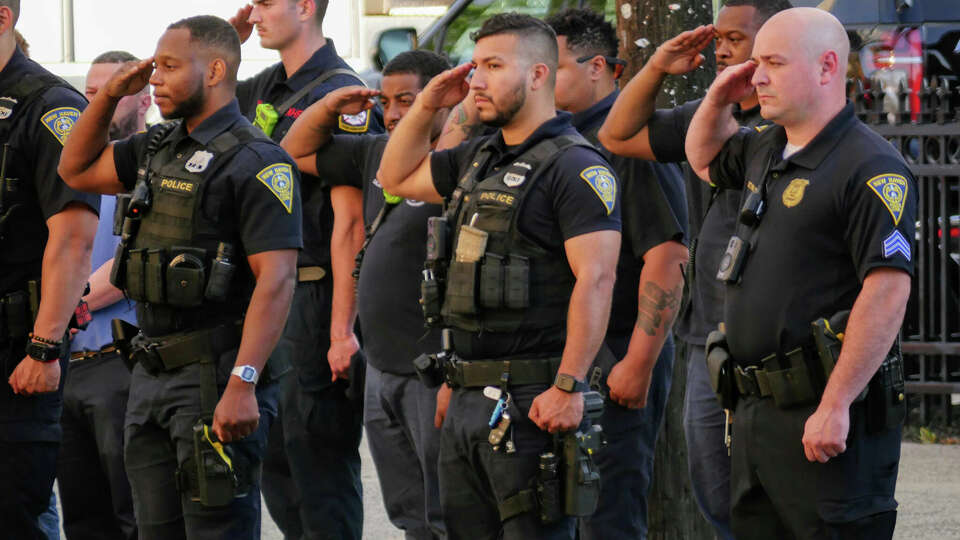 The procession for slain Minneapolis police officer Jamal Mitchell arrives at McClam Funeral Home in New Haven, Conn., Wednesday, June 12, 2024.