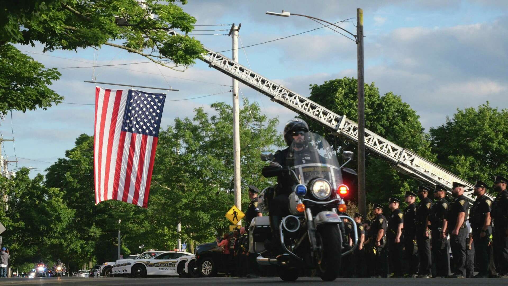 Minneapolis police officer killed in ambush escorted to CT hometown