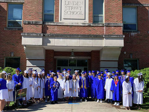 Plainville High graduates visit their former elementary schools