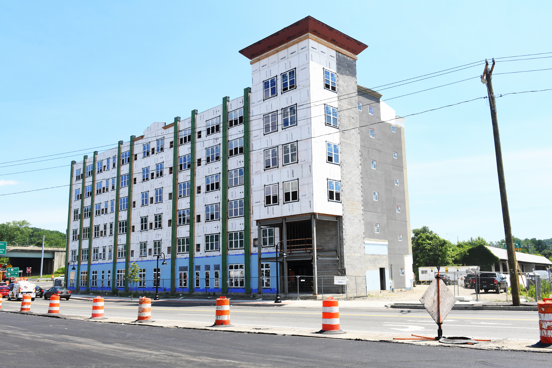 A developer claims Derby is reneging on a tax deal that helped bring a $16 million apartment project downtown.