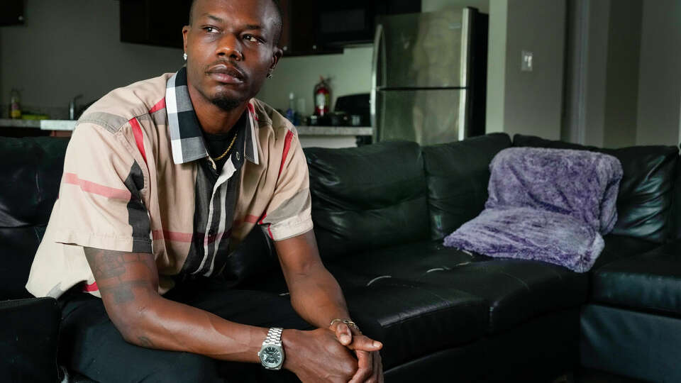 Jabon Barrett poses for a portrait on Thursday, May 30, 2024 in Houston. Barrett was wrongfully arrested and locked up for about six weeks last winter. Authorities claimed Barrett was a felon in posession of a weapon, when he does not have a felony and is a legal gun owner.