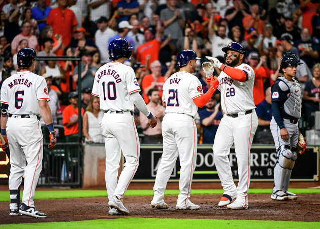 Jon Singleton #28 celebrates with Yainer Diaz #21, Joey Loperfido #10, and Jake Meyers #6 of the Houston Astros after hitting a three-run home run in the fourth inning against the Cleveland Guardians at Minute Maid Park on April 30, 2024 in Houston, Texas. 