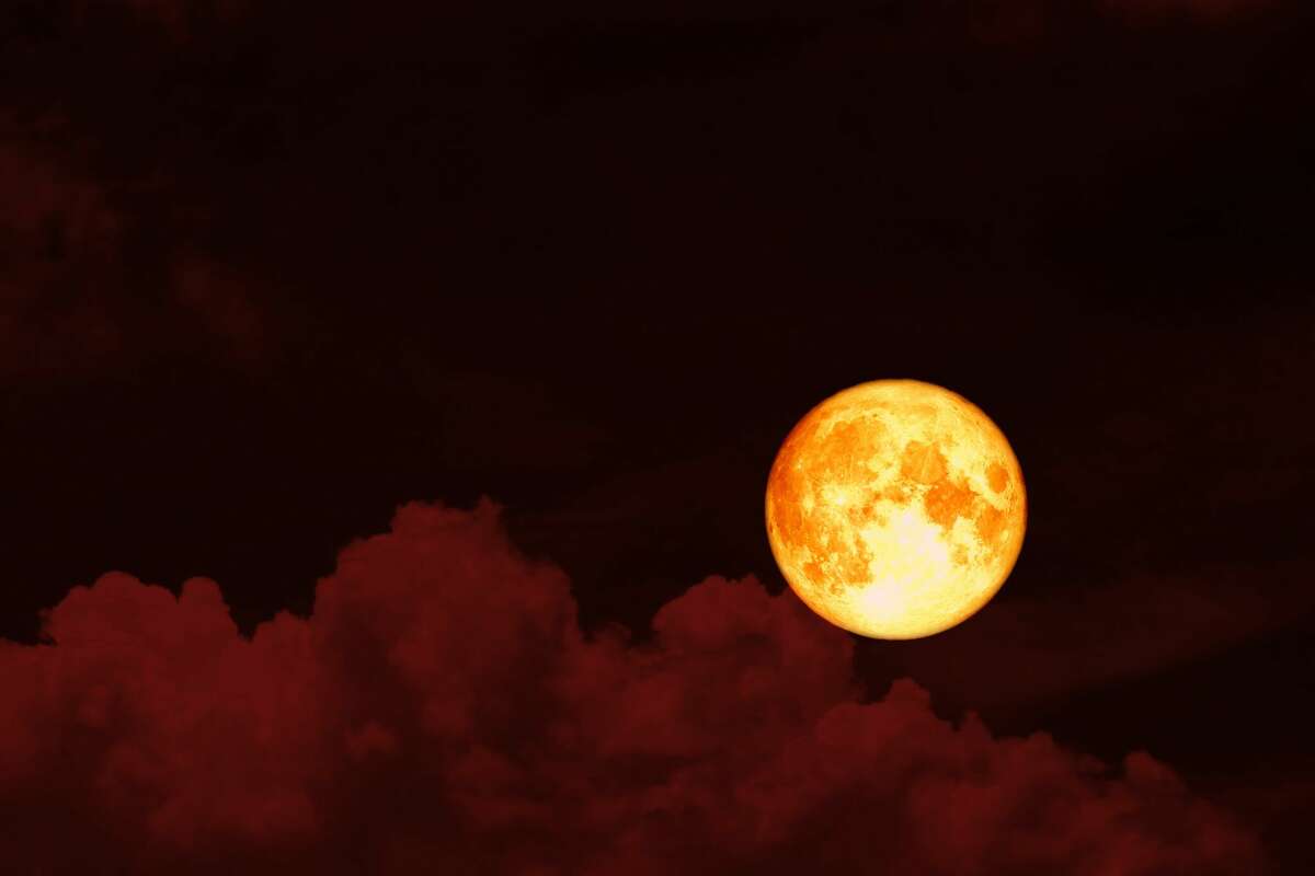 June's full Strawberry Moon may appear red or orange due to its low spot in the sky. 