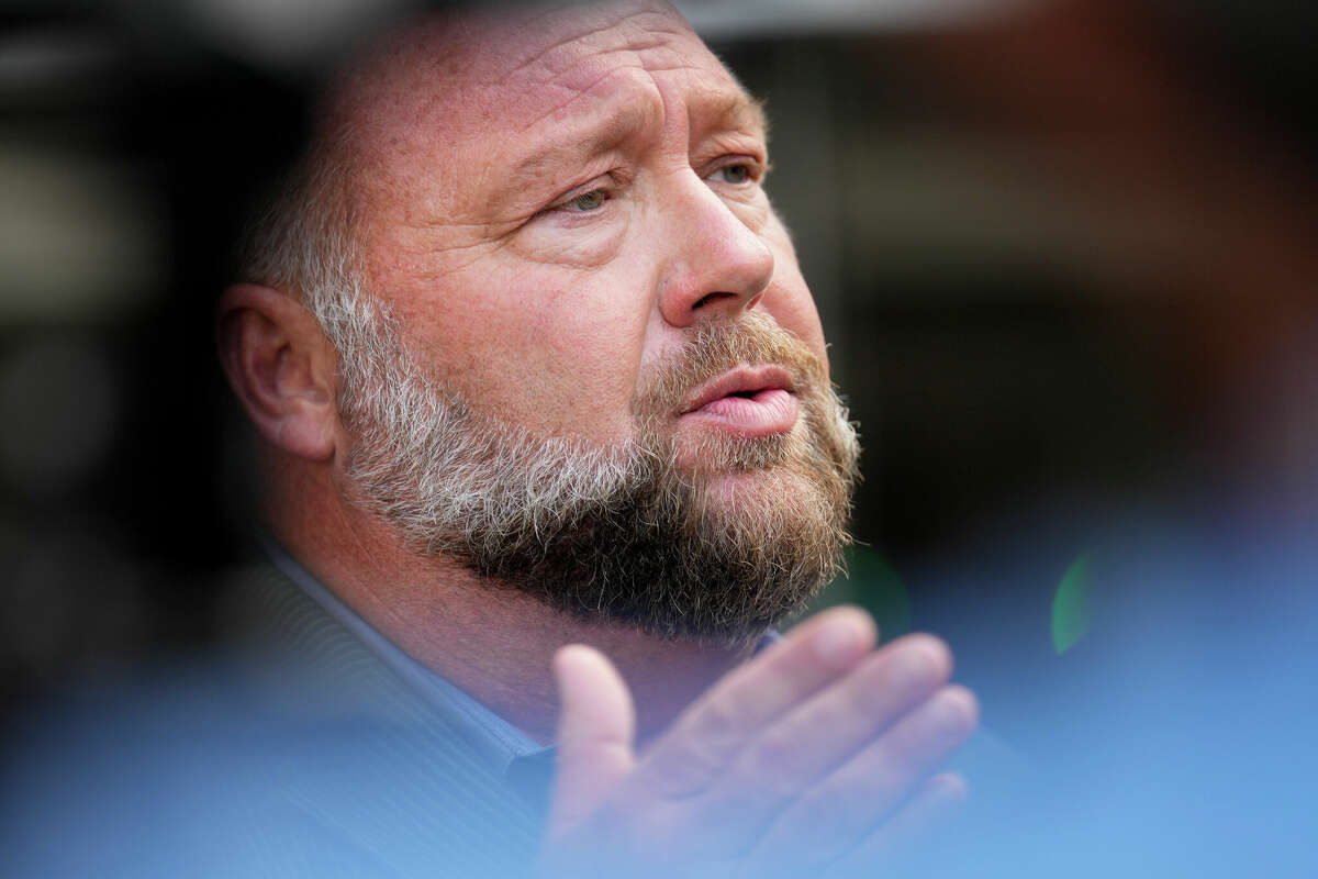 HOUSTON, TEXAS - JUNE 14: Right-wing conspiracy theorist Alex Jones speaks to the press before his bankruptcy hearing Friday, June 14, 2024 at Bob Casey Federal Courthouse in Houston. (Yi-Chin Lee/Houston Chronicle via Getty Images)