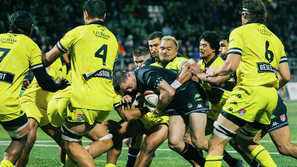 AJ Alatimu wraps up a Seattle Seawolves ball carrier as more Houston SaberCats players close in during their Major League Rugby fixture March 22 at Starfire Stadium.