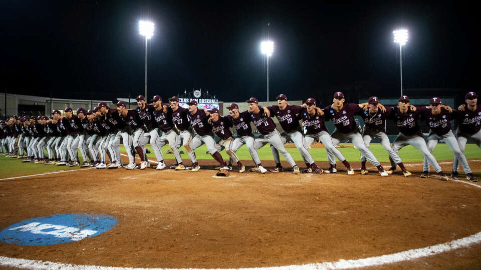 The Texas A&M baseball team sings the Aggie War Hymn after a 9-4 win in the Bryan-College Station Regional NCAA baseball game against Louisiana, Sunday, June 2, 2024, in College Station, Texas. (Meredith Seaver/College Station Eagle via AP)