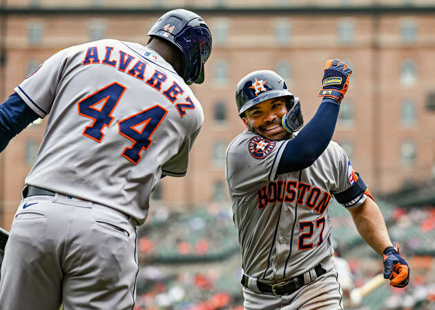 August 10: Houston Astros second baseman Jose Altuve (27) celebrates his score with designated hitter Yordan Alvarez (44) during the Houston Astros versus the Baltimore Orioles on August 10, 2023 at Oriole Park at Camden Yards in Baltimore, MD. 