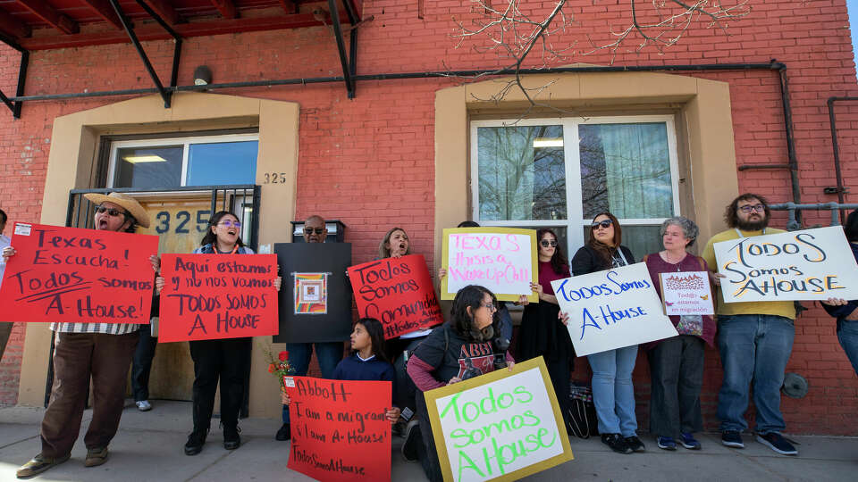 FILE - Local residents demonstrate their support for Annunciation House, Feb. 23, 2024, in El Paso, Texas. On Monday, March 11, 2024, a Texas judge ruled in favor of Annunciation House, a large migrant shelter on the U.S.-Mexico border that Republican Attorney General Ken Paxton is seeking to shut down over claims that the facility encourages migrants to enter the country illegally. (AP Photo/Andres Leighton, File)