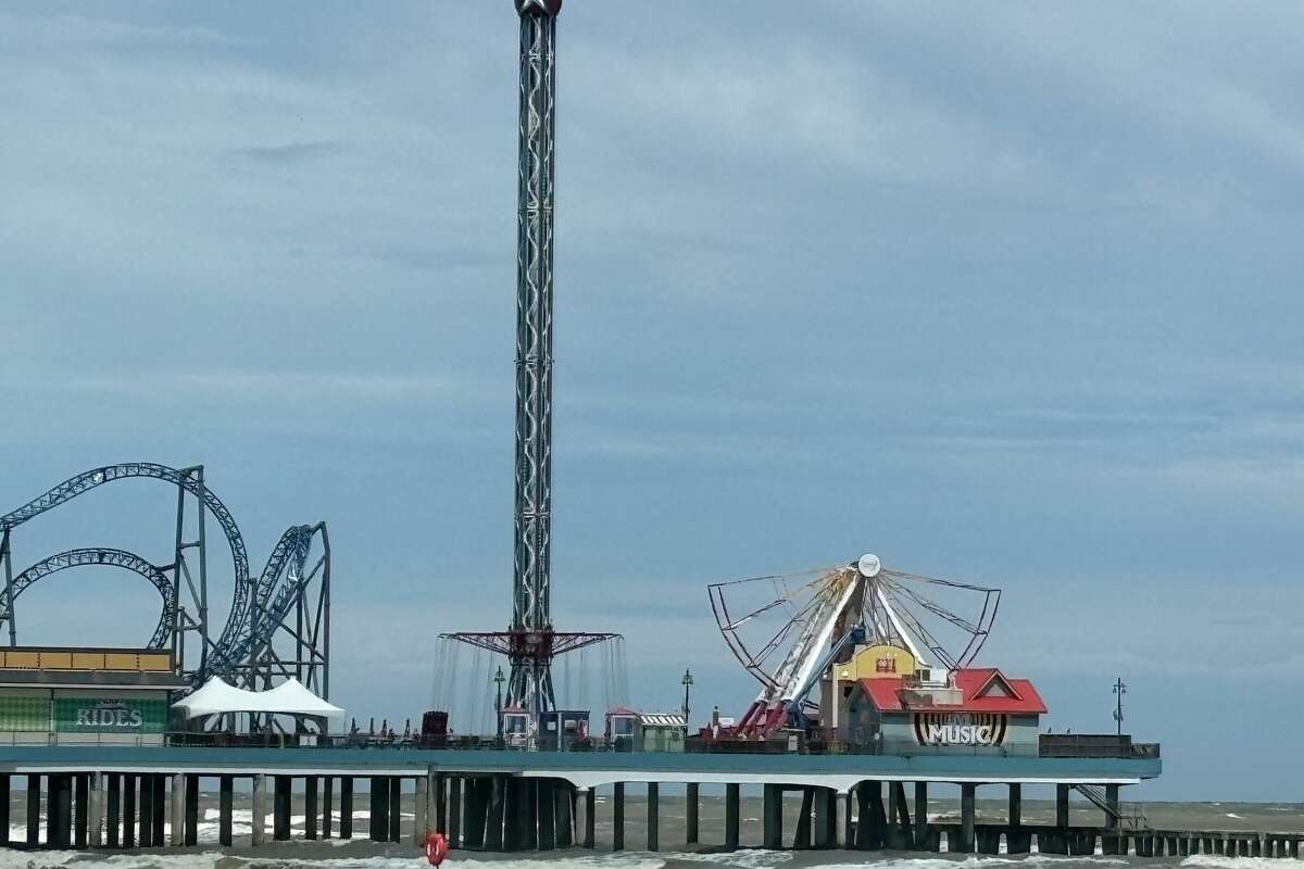 Monday's slow disassembly of Pleasure Pier's Galaxy Wheel (right) has been a hot topic of conversation in Galveston this week.