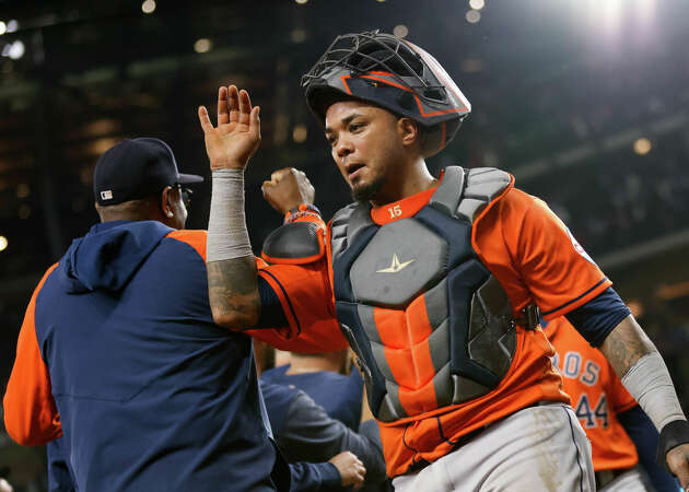 Martin Maldonado #15 of the Houston Astros celebrates with teammates after Game 4 of the ALCS between the Houston Astros and the Texas Rangers at Globe Life Field on Thursday, October 19, 2023 in Arlington, Texas.