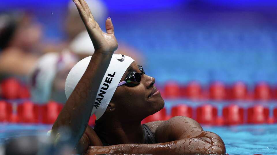 INDIANAPOLIS, INDIANA - JUNE 18: Simone Manuel of the United States reacts after a preliminary heat of the Women's 100m freestyle on Day Four of the 2024 U.S. Olympic Team Swimming Trials at Lucas Oil Stadium on June 18, 2024 in Indianapolis, Indiana.