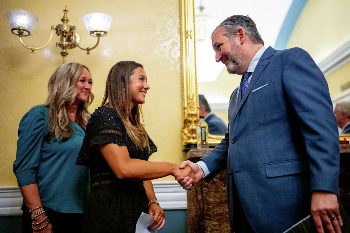 *** BESTPIX *** WASHINGTON, DC - JUNE 18: Sen. Ted Cruz (R-TX) speaks with Elliston Berry (C), a victim of deepfake image abuse, and her mother Anna McAdams (L) following a news conference to unveil the Take It Down Act to protect victims against non-consensual intimate image abuse, on Capitol Hill on June 18, 2024 in Washington, DC. Cruz introduced the bipartisan 'Tools to Address Known Exploitation by Immobilizing Technological Deepfakes on Websites and Networks Act' (TAKE IT DOWN) which would criminalize the publication of non-consensual intimate imagery and require social media sites to remove nefarious imagery if it is flagged by a victim.