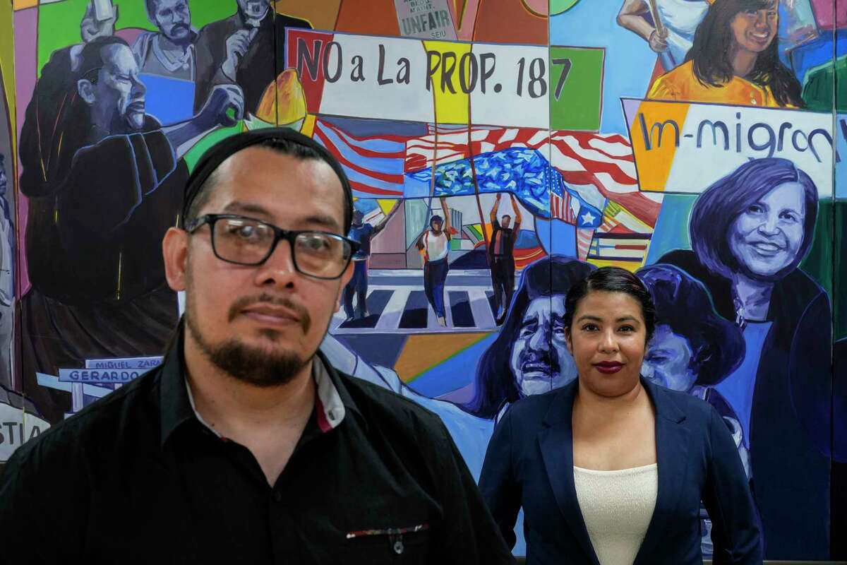 Antonio Valle, left, and wife, Brenda, stand for a photo after an interview with The Associated Press in Los Angeles, Tuesday, June 18, 2024. Both were born in Mexico. Antonio Valle has been a U.S. citizen since 2001. Brenda Valle came to the U.S. with her family when she was 3 years old and will now be eligible for legal status under Biden's new plan. She is a DACA recipient and has worried every two years whether it would get renewed. Their sons are U.S. citizens.