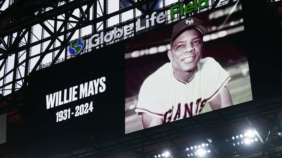 ARLINGTON, TEXAS - JUNE 19: A general view of a graphic honoring Willie Mays is shown before the game between the Texas Rangers and the New York Mets at Globe Life Field on June 19, 2024 in Arlington, Texas. Mays passed away on June 18, 2024. (Photo by Sam Hodde/Getty Images)