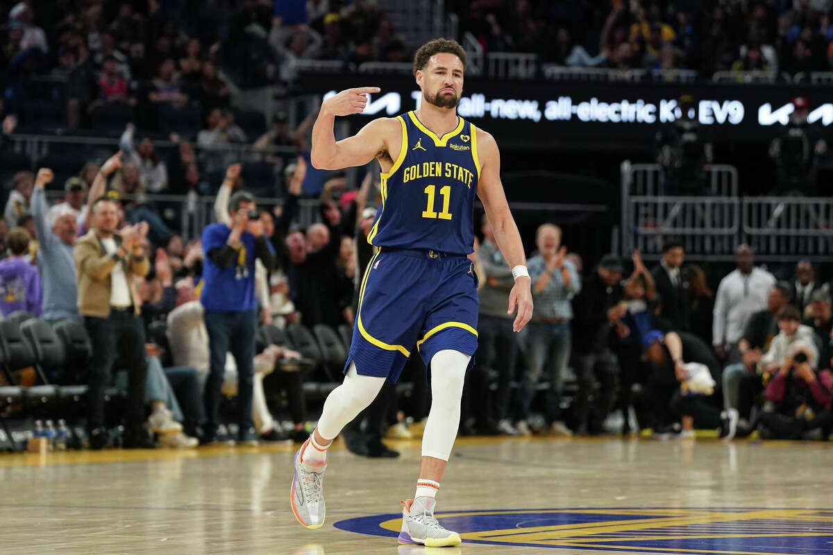 Klay Thompson of the Golden State Warriors reacts to making a basket in the third quarter against the New Orleans Pelicans at Chase Center on April 12, 2024 in San Francisco, California.