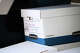 Boxes of evidence are loaded into the back of an FBI vehicle during a raid on California Waste Solutions on Thursday.