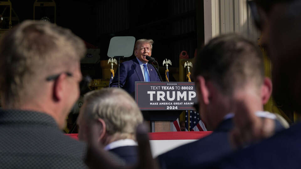 Former President Donald Trump speaks to a crowd as he makes a campaign stop on Thursday, Nov. 2, 2023, in Houston.