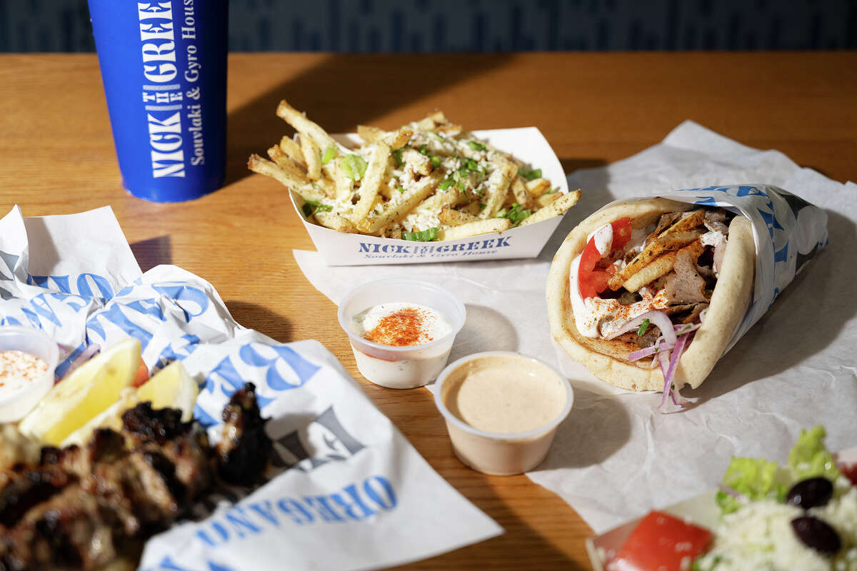 Pork Souvlaki, Lamb Gyro, and Greek Fries at Nick The Greek in San Jose Calif., June 20, 2024.