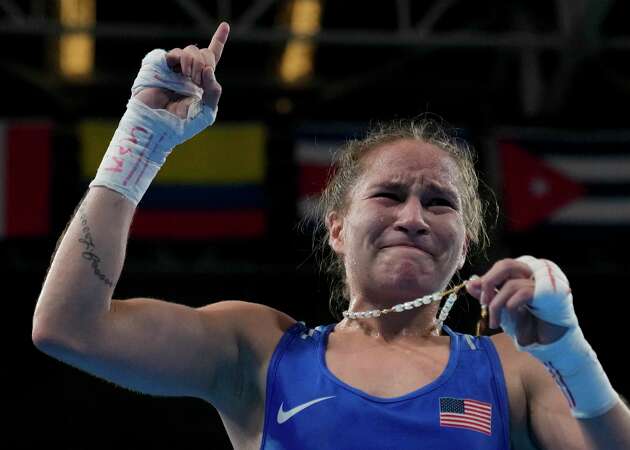 Jennifer Lozano celebrates securing an Olympic berth by beating Canada's Mckenzie Wright in the semifinals of the Pan American Games in Santiago, Chile on Thursday, Oct. 26, 2023.