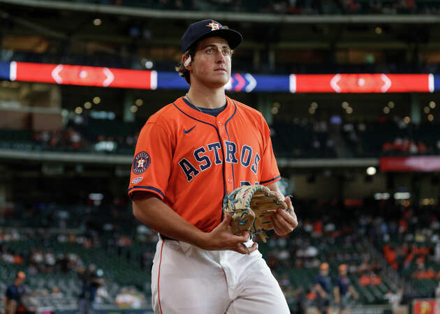 Jake Bloss #39 of the Houston Astros walks to the bullpen to warm up before his MLB debut against the Baltimore Orioles at Minute Maid Park on June 21, 2024 in Houston, Texas. 