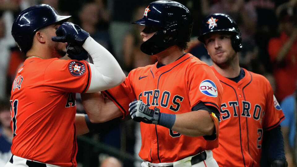 Houston Astros Jake Meyers, center, celebrates with Yainer Diaz after hitting a three-run home run off Baltimore Orioles starting pitcher Grayson Rodriguez to take a 5-3 lead in the fifth inning of an MLB baseball game at Minute Maid Park, Friday, June 21, 2024, in Houston.