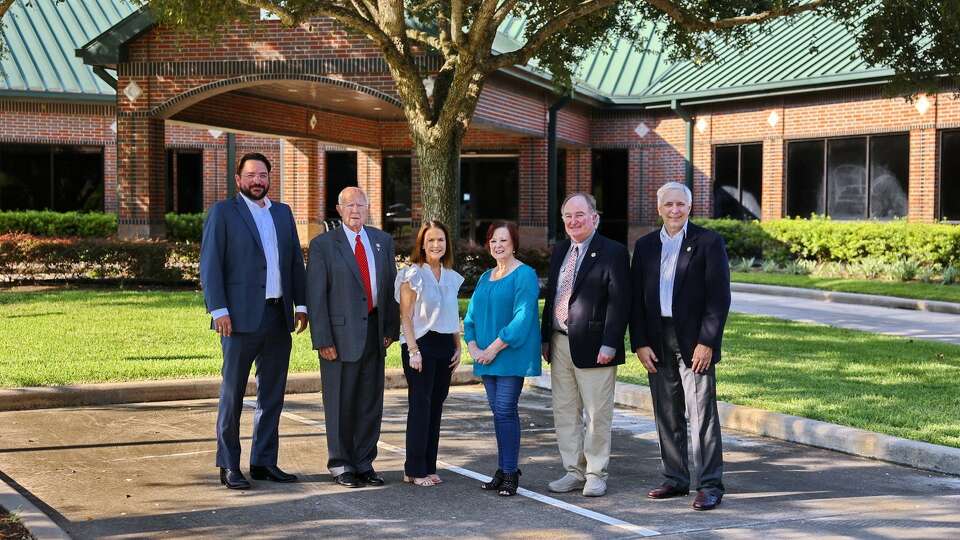 Richmond community leaders stand in front of the future home of Richmond City Hall. From left to right: Commissioner Alex BeMent, Commissioner Barry Beard, City Manager Terri Vela, Mayor Becky Haas, Mayor Pro-Tem Carl Drozd, and Commissioner Terry Gaul