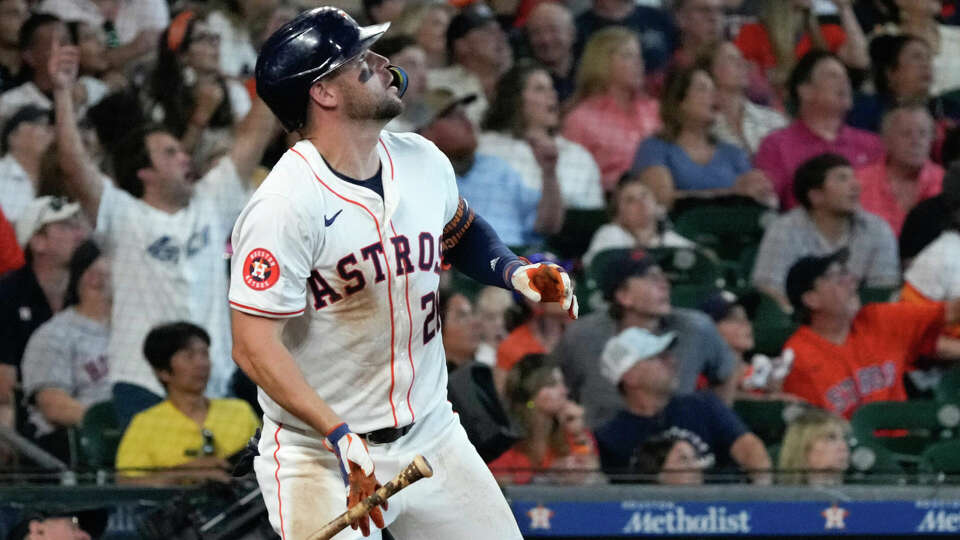 Houston Astros Chas McCormick watches his solo home run off Baltimore Orioles starting pitcher Corbin Burnes land in the stands in the fifth inning of an MLB baseball game at Minute Maid Park, Saturday, June 22, 2024, in Houston.