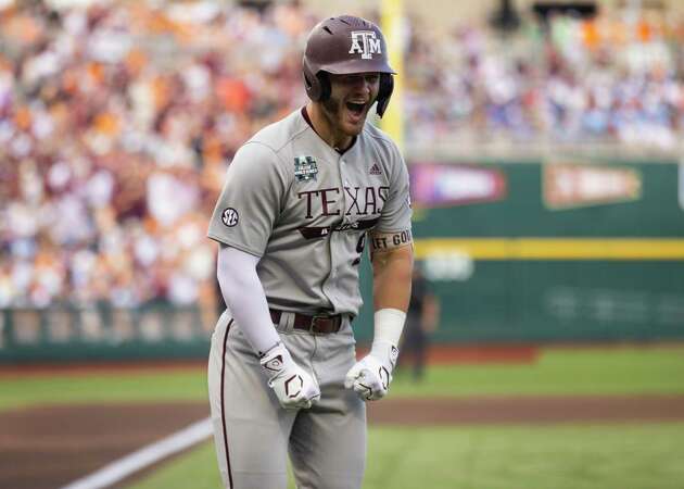 Texas A&M's Gavin Grahovac celebrates after hitting a solo home run against Tennessee during the first inning of Game 1 of the NCAA College World Series baseball finals in Omaha, Neb., Saturday, June 22, 2024.