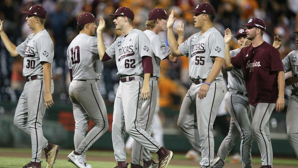 Texas A&M celebrates after defeating Tennessee 9-5 during game 1 of the Mens College Worlds Series finals at Charles Schwab field on Saturday, June 22, 2024, in Omaha. ( J. Patric Schneider / For the Chronicle )