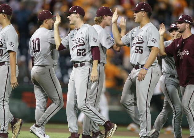 Texas A&M celebrates after defeating Tennessee 9-5 during game 1 of the Mens College Worlds Series finals at Charles Schwab field on Saturday, June 22, 2024, in Omaha. ( J. Patric Schneider / For the Chronicle )