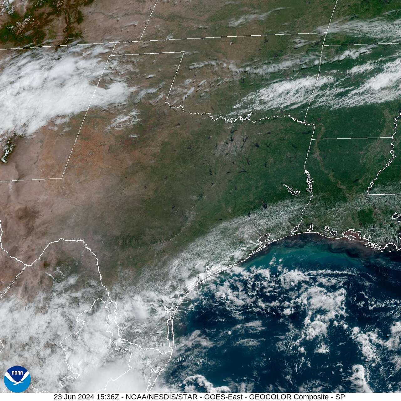 In this weather satellite photo of Texas taken Sunday morning, the southern tip of the state is obscured by clouds churned up by a tropical disturbance that was moving inland from the Gulf of Mexico. A moisture-rich tropical air mass flowing in from the coast will drive up humidity levels in Houston this week.