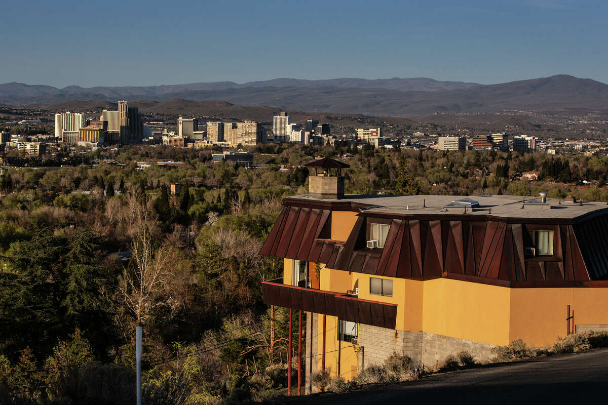 FILE - The downtown skyline of Reno is viewed from a nearby hilltop looking northeast on April 4, 2022. Ground-level ozone was detected in the area earlier this month.