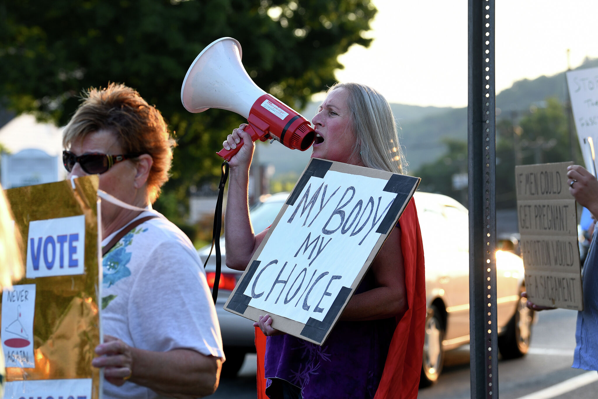 New Milford group rallies for women's rights on Town Green