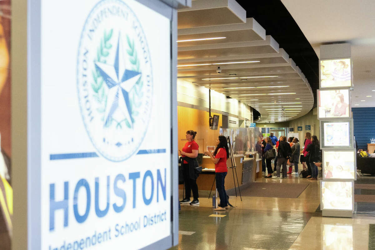 HOUSTON, TEXAS - MARCH 21: People wait to speak during a Houston ISD Board of Managers meeting at the Hattie Mae White Educational Support Center, Thursday, March 21, 2024, in Houston. 150 people signed up to speak at the meeting. (Jason Fochtman/Houston Chronicle via Getty Images)