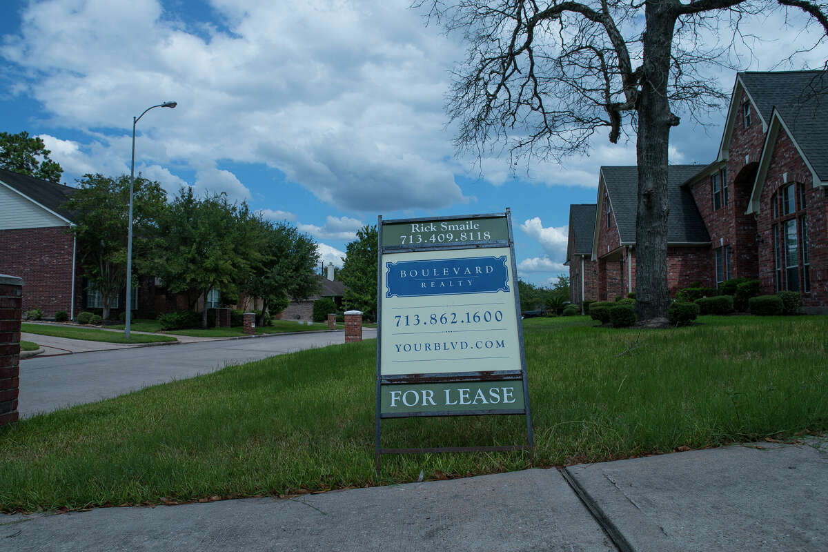 A for sale sign sits in front of a home in the Wimbledon Champions neighborhood in Spring, Monday, Sept. 16, 2019. Several homes in the area have been purchased by investors after Harvey and are in various states of repair from fully remodeled to currently in foreclosure. (Photo by Mark Mulligan/Houston Chronicle via Getty Images)