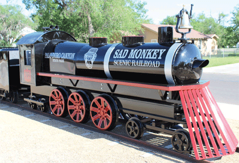 Logan gives Sad Monkey Railroad train new home on Square