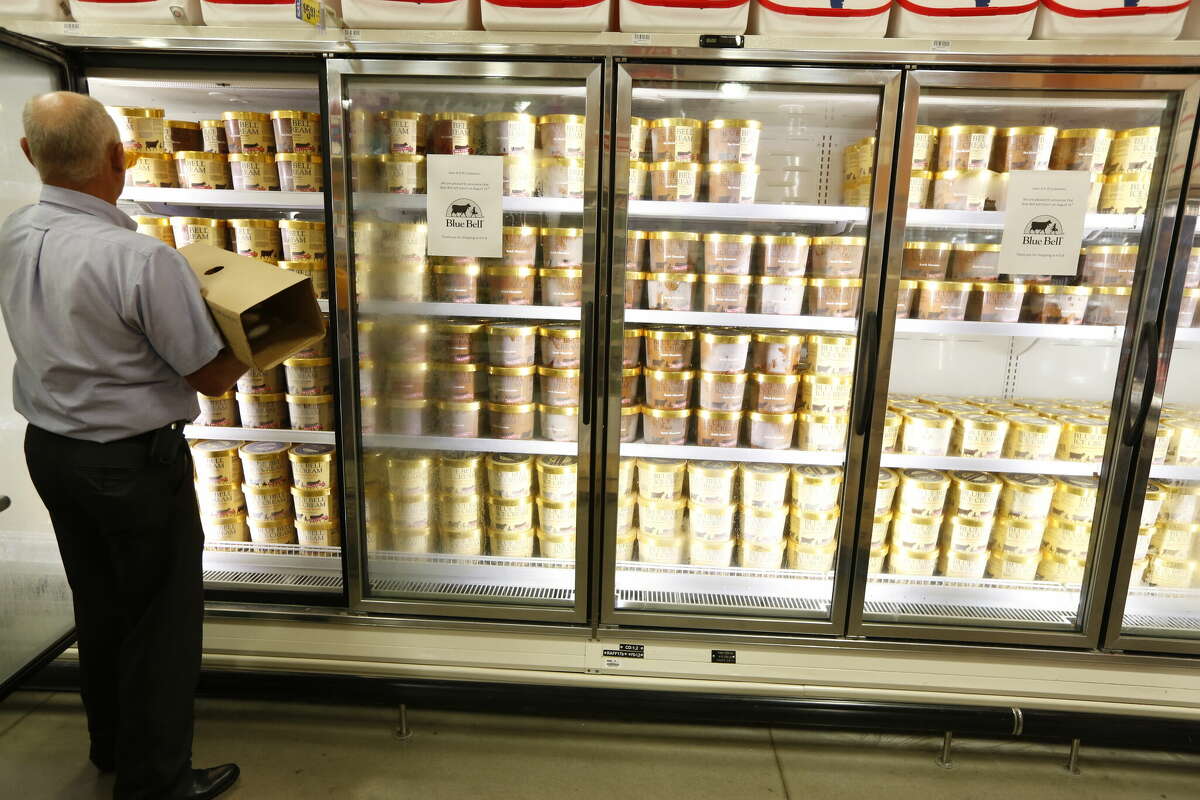 Blue Bell personnel Ricky Seilheimer stocks H-E-B freezers with Blue Bell products before 6 a.m. Monday, Aug. 31, 2015, in Brenham. ( Steve Gonzales / Houston Chronicle ) (Photo by Steve Gonzales/Houston Chronicle via Getty Images)