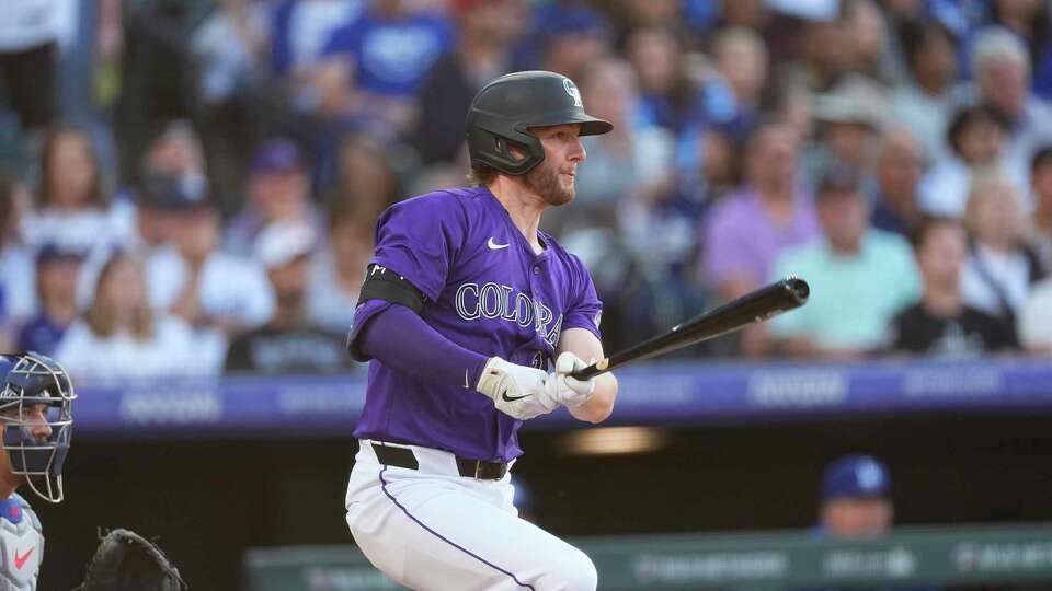 Colorado Rockies third baseman Ryan McMahon (24) in the third inning of a baseball game Wednesday, June 19, 2024, in Denver. (AP Photo/David Zalubowski)