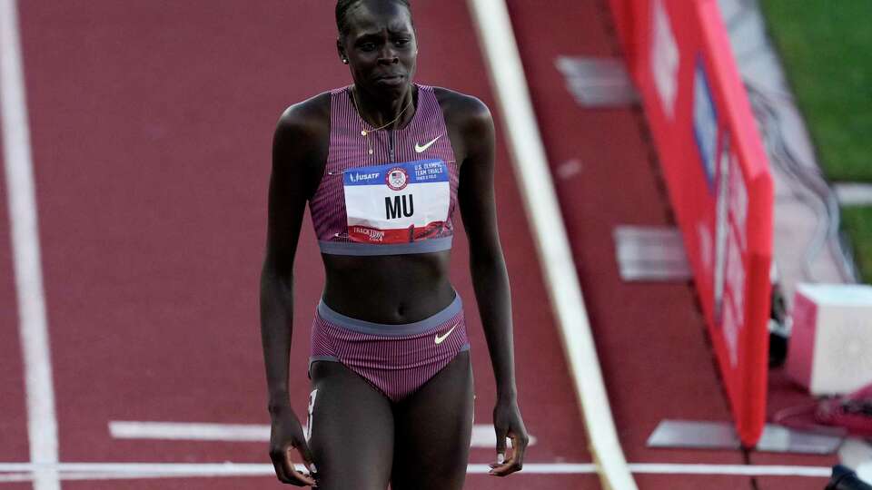 Athing Mu walks off after falling in the women's 800-meter final during the U.S. Track and Field Olympic Team Trials Monday, June 24, 2024, in Eugene, Ore.