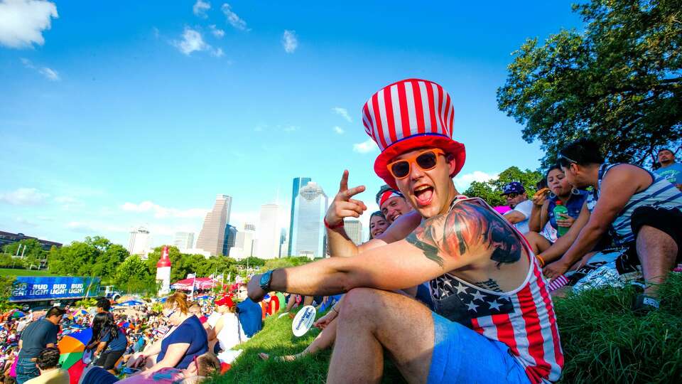 Spectator reacts when his photo was taken at Eleanor Tinsley Park during Freedom Over Texas, Monday, July 04, 2016, in Houston. (Juan DeLeon/for the Houston Chronicle )