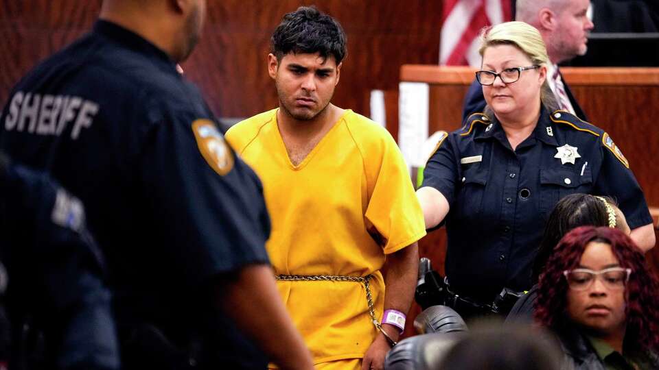 Johan Jose Martinez-Rangel, one of the two men accused of killing 12-year-old Jocelyn Nungaray, is led from the courtroom by deputies on Tuesday, June 25, 2024 in Houston. Martinez-Rangel was ordered held on $10 million bail as he, and another man, Franklin Peña, are charged with capital murder over the girl's death. They're accused of leading her under a bridge in north Houston, and then strangling her. Her body was found June 17 in the bayou near the 400 West Rankin Road.