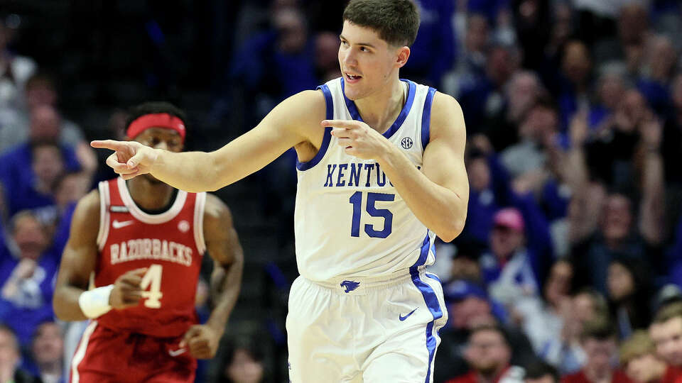 Reed Sheppard of the Kentucky Wildcats celebrates after making a three point shot in the first half against the Arkansas Razorbacks at Rupp Arena on March 2, 2024 in Lexington, Kentucky.