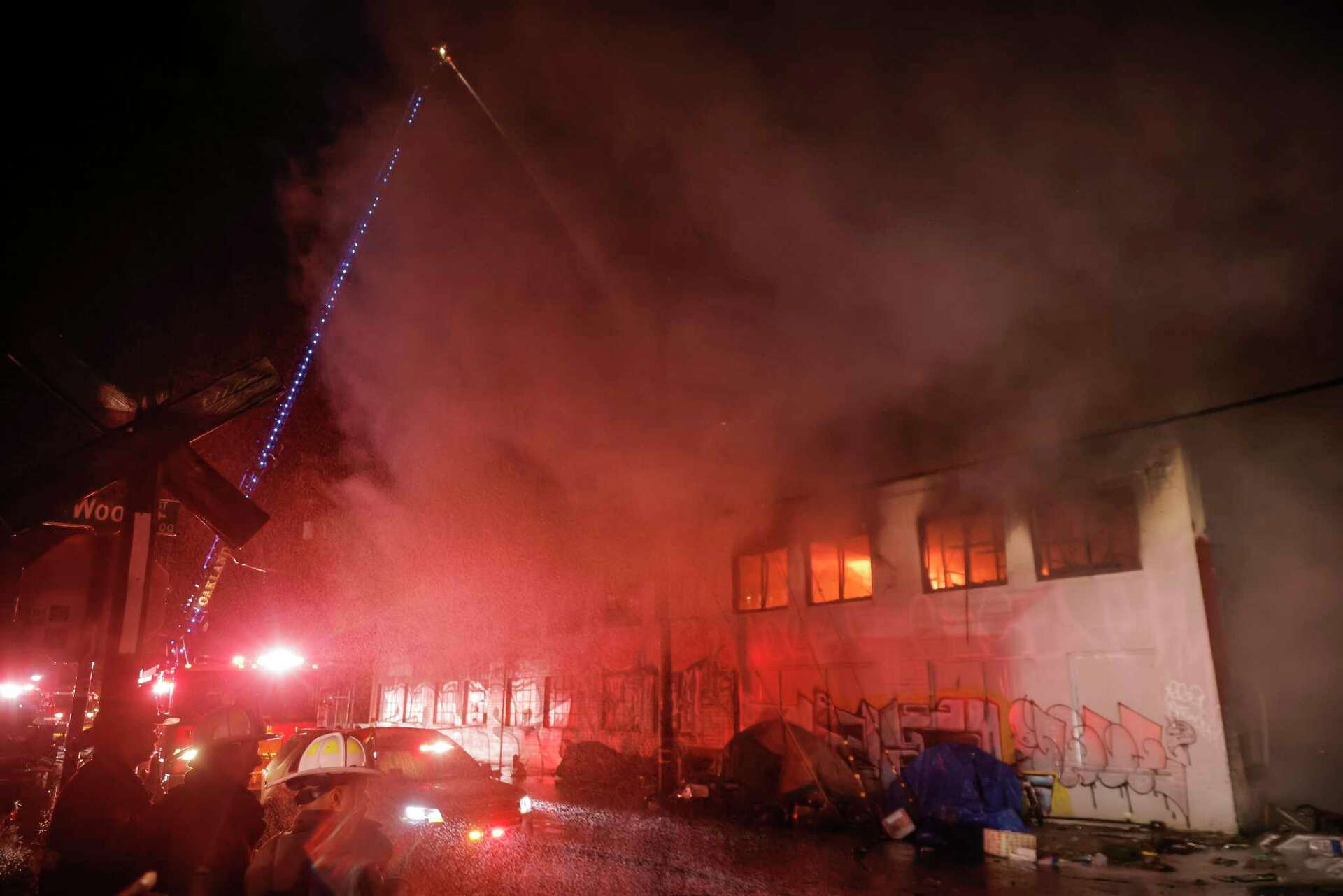 70 firefighters battle massive fire in West Oakland warehouse