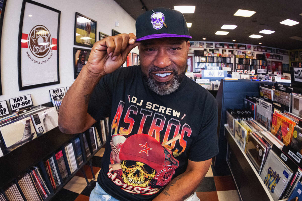 Houston rapper Bun B models one of the new DJ Screw-themed hats and t-shirts that will be sold on DJ Screw Day at the Astros' Centerfield Store.