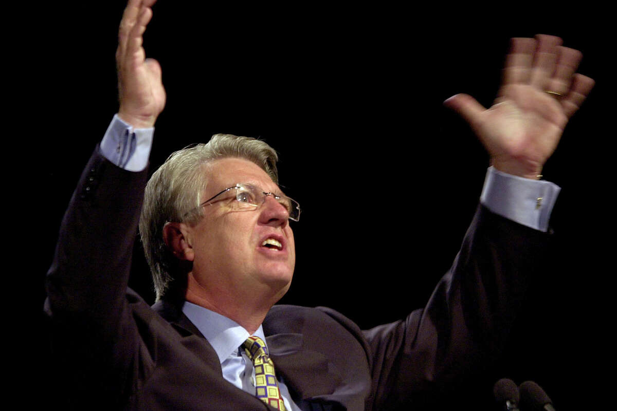 Former president of the Southern Baptist Convention Jack Graham, of Plano, Texas, preaches to a group of followers.