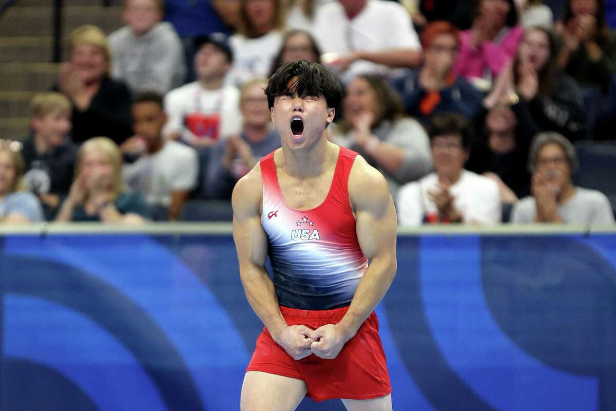 MINNEAPOLIS, MINNESOTA - JUNE 27: Asher Hong reacts after finishing his routine in the Floor Exercise on Day One of the 2024 U.S. Olympic Team Gymnastics Trials at Target Center on June 27, 2024 in Minneapolis, Minnesota.