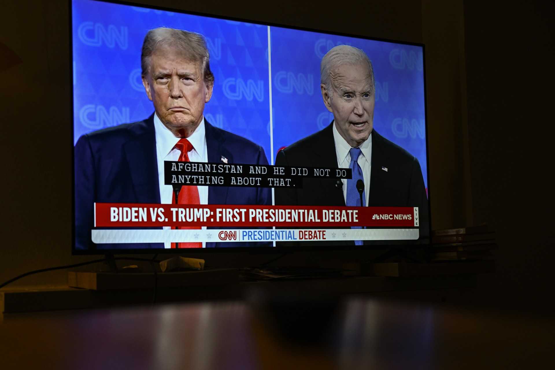 A raspy and sometimes halting Biden tries at debate to confront Trump ...