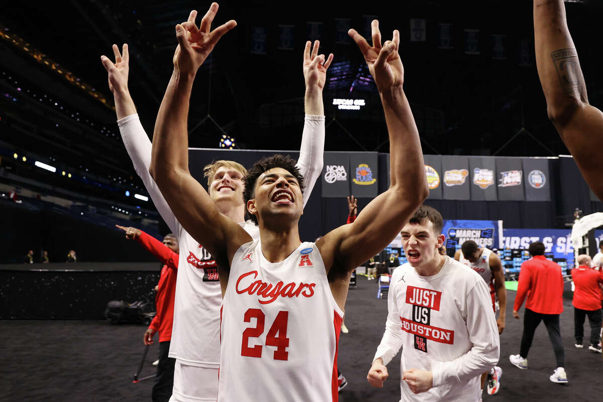 Quentin Grimes #24 of the Houston Cougars celebrates after defeating the Rutgers Scarlet Knights in the second round of the 2021 NCAA Division I Men's 2019 Basketball Tournament held at Lucas Oil Stadium on March 21, 2021 in Indianapolis, Indiana.